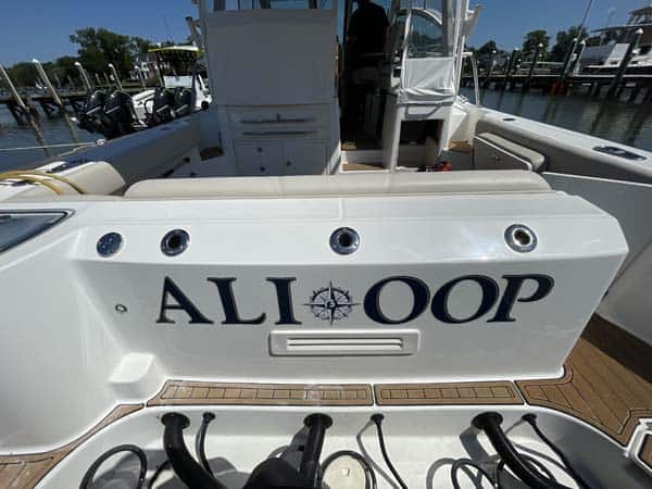 Boat wraps and graphics. Compass boat graphic for ALI OOP