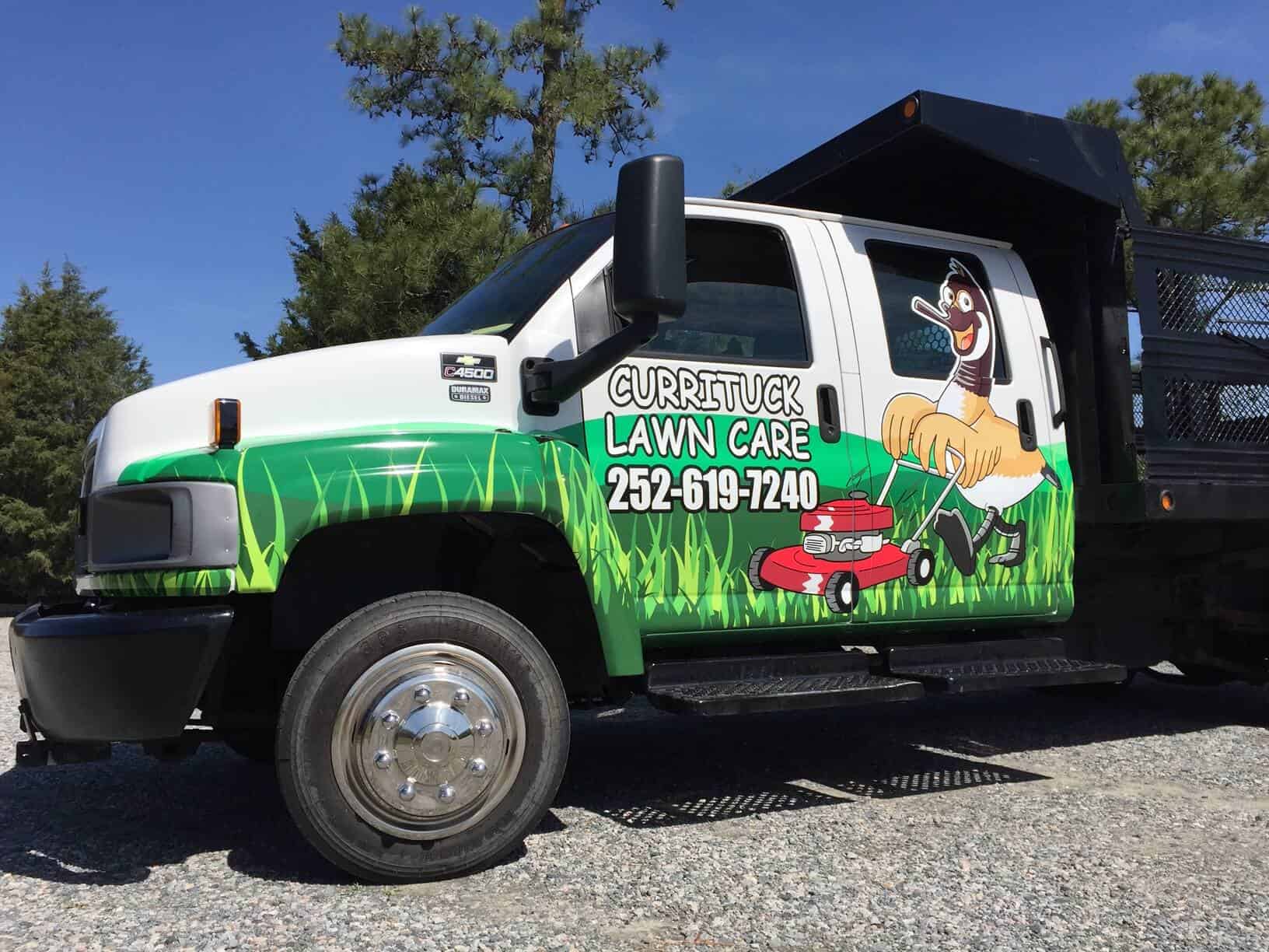 Dump truck wrap for Currituck Lawn Care