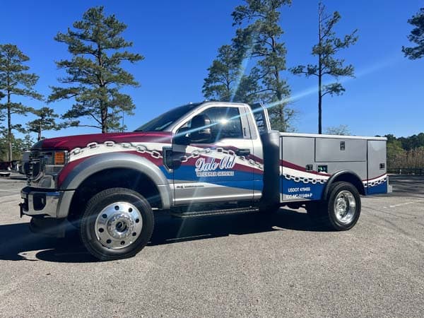 Vehicle wrap for F450 wrecker truck from DeSigns, Inc. for signs, banners, wraps, and promotional products.