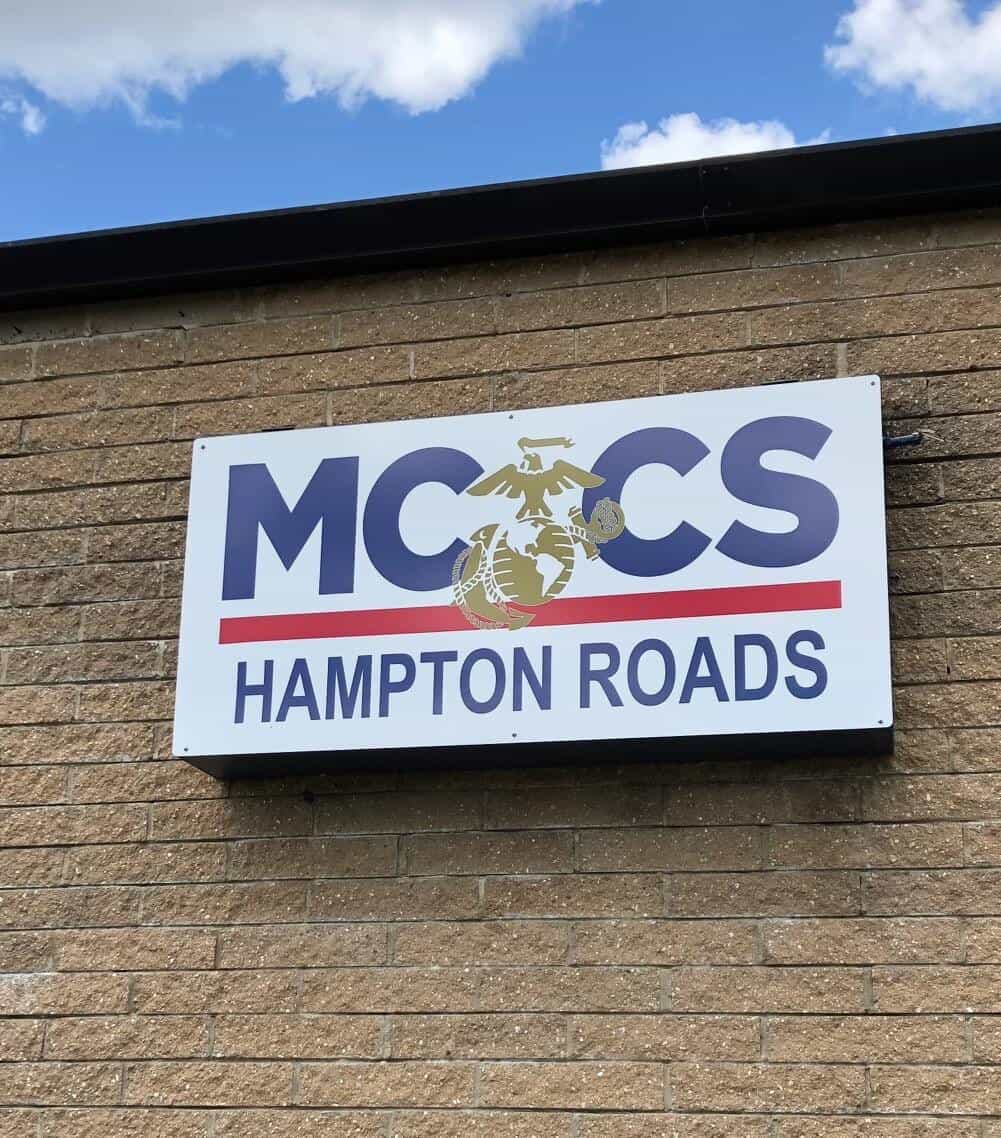 Sign off-set on cinder-block for MCCS Hampton Roads