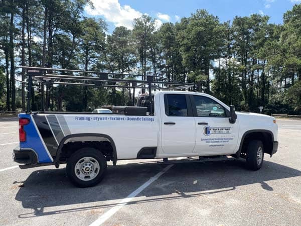 Partial vehicle wrap from DeSigns, Inc. for signs, banners, wraps, and promotional products.