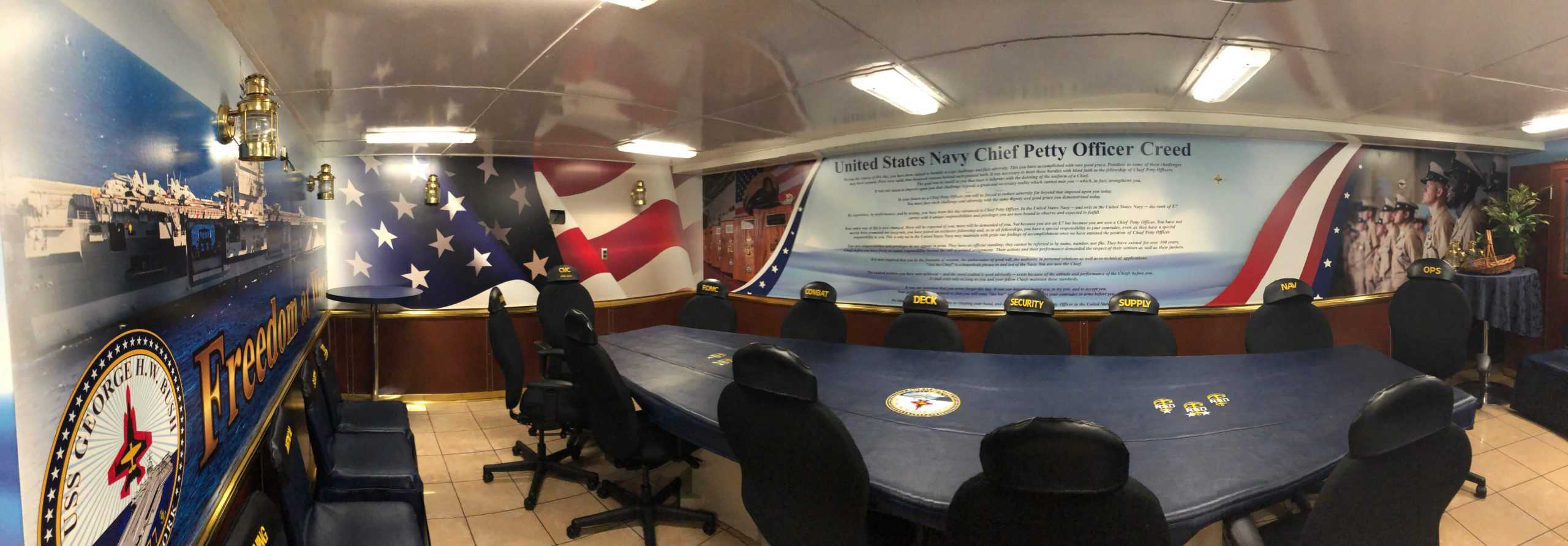 Patriotic freedom wrap for U.S. Navy. All four wall wrapped by DeSigns, Inc.