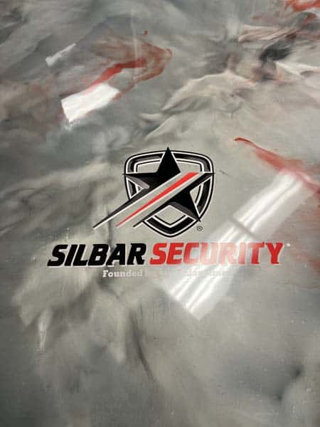Add a logo graphic to your office floor or lobby - See Silbar floor graphic by DeSigns, Inc.