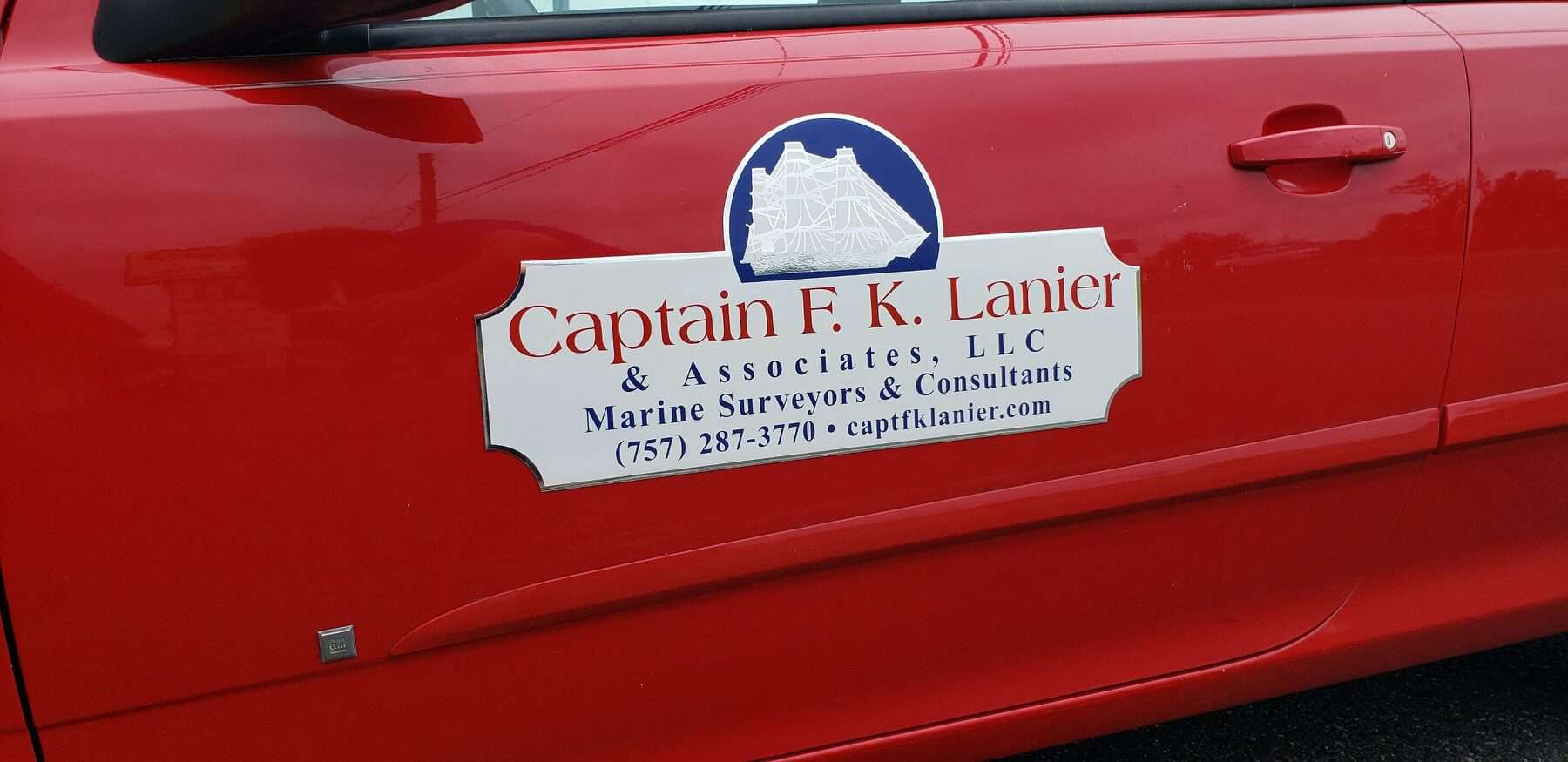 Magnetic car signs for your business by DeSigns, Inc.
