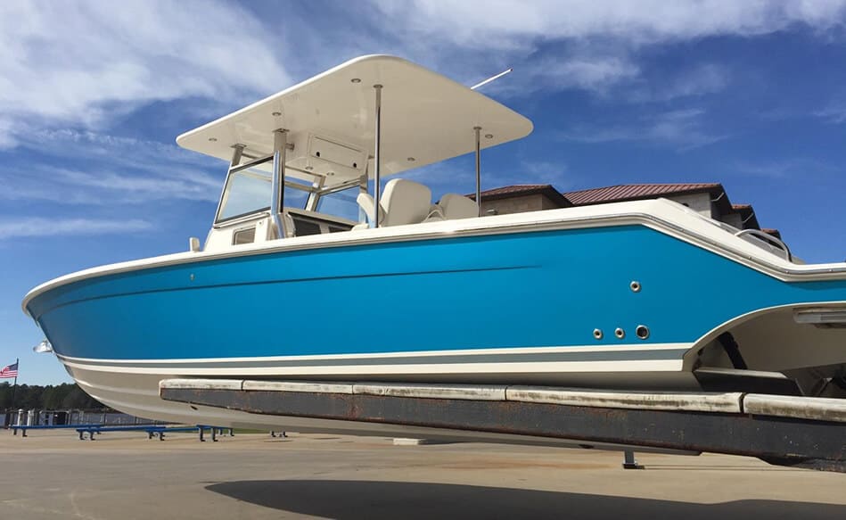 Change the color of your boat and a boat wrap from DeSigns, Inc.