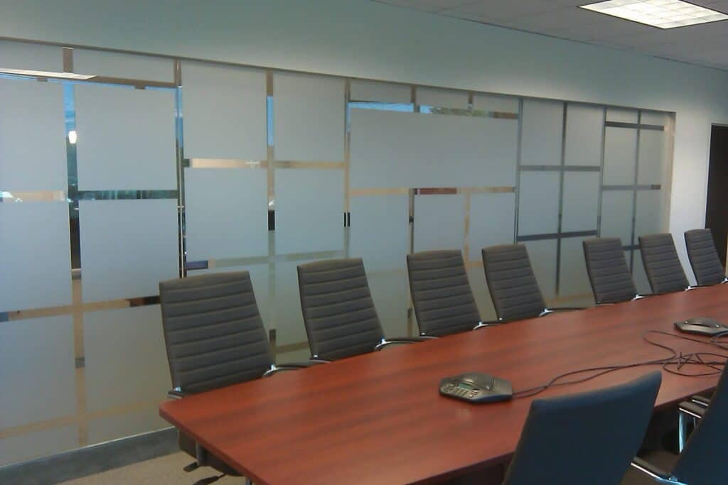 Etch glass in corporate conference room