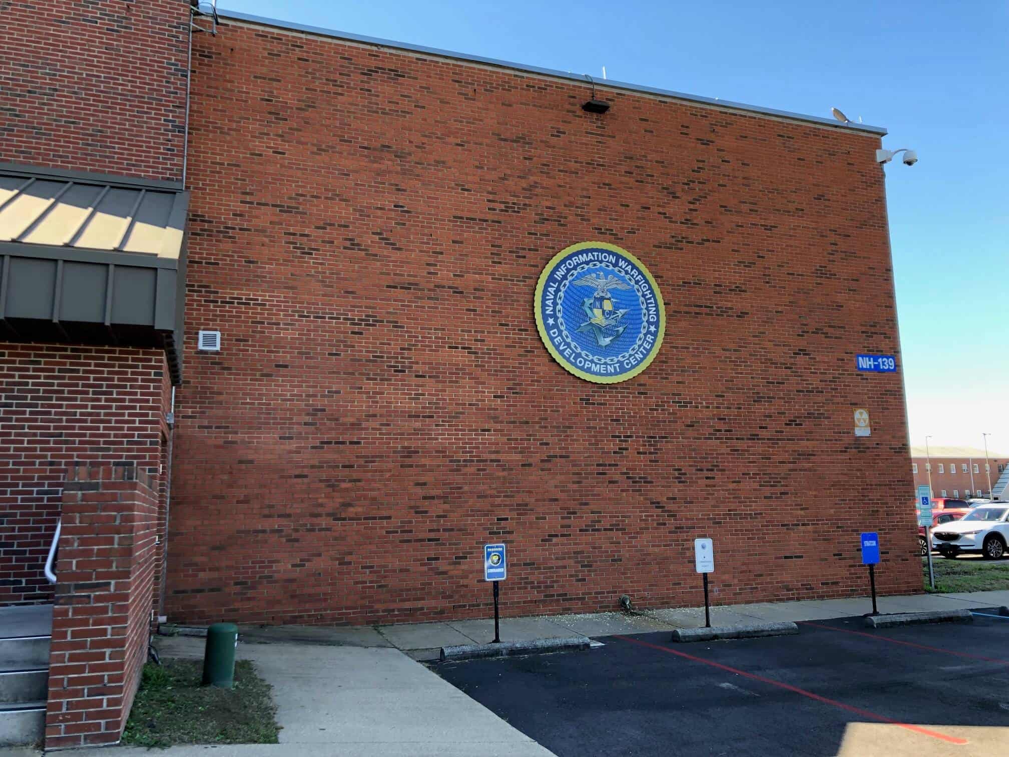 Seal mounted on brick exterior signage