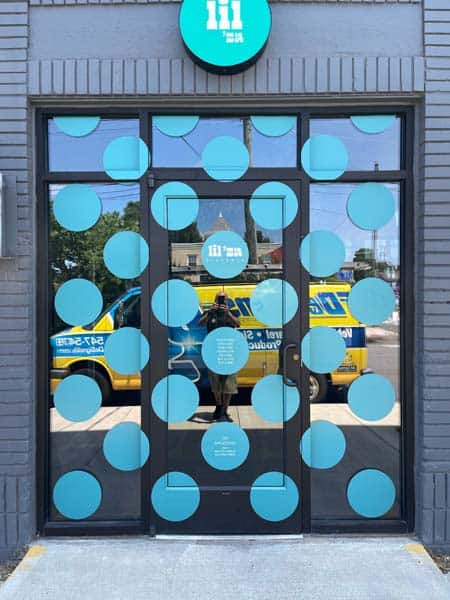 Window film graphics offers privacy and security. See lil-za pizza window graphics.