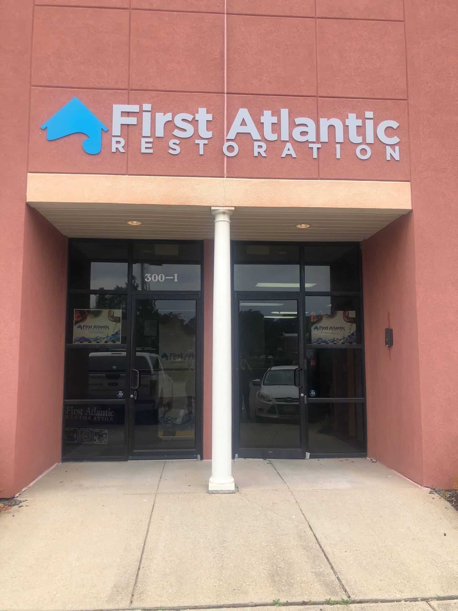 Mounted plastic letter signs - Sign for First Atlantic Restoration building