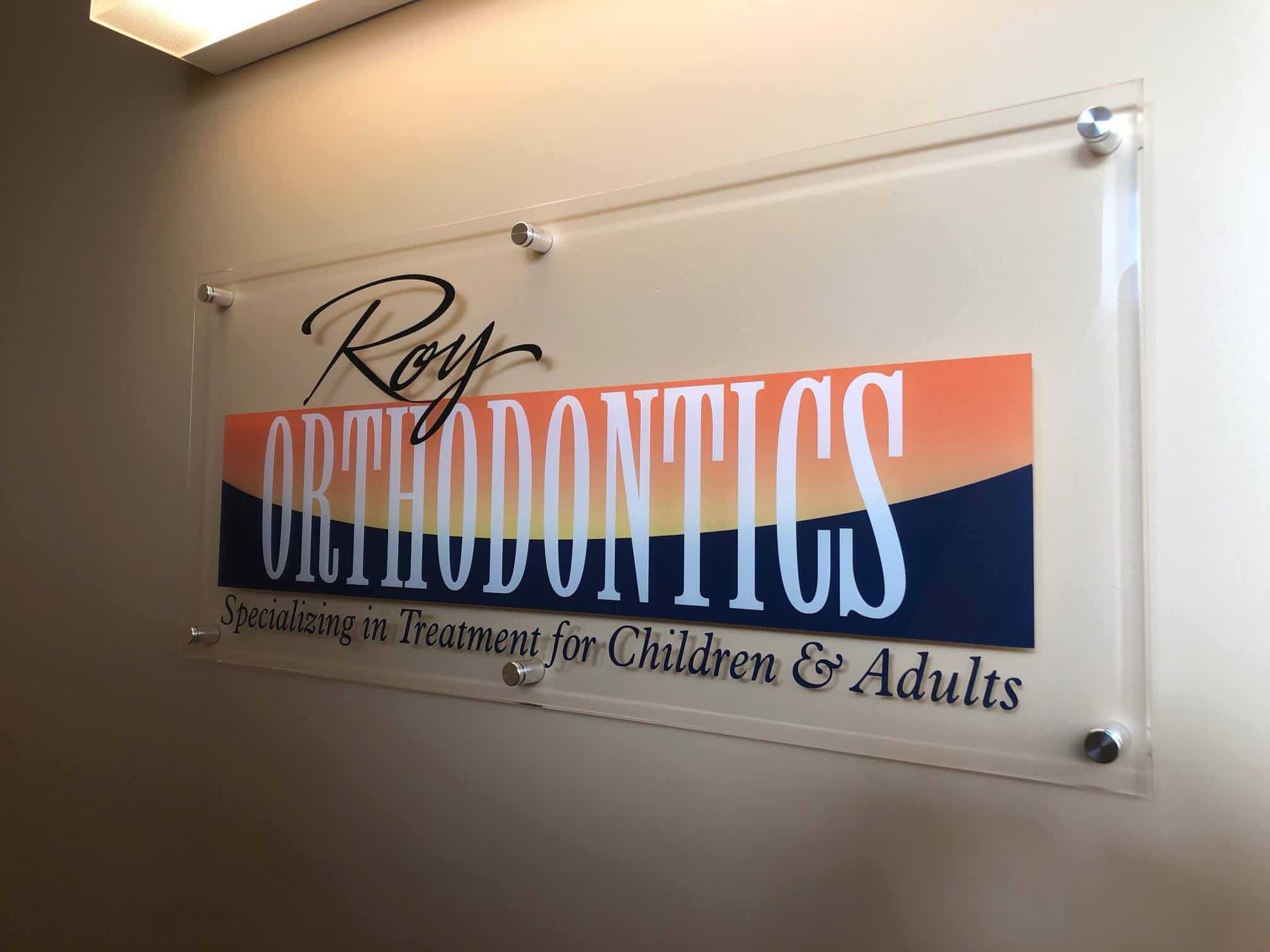 Stand-off Interior acrylic lobby sign for Roy Orthodontics