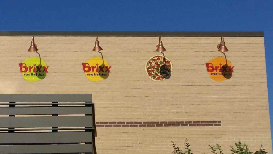 Textured wall graphics on brick building for Brixx Wood Fire Pizza