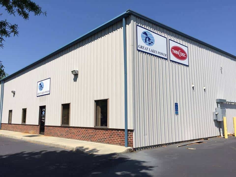 Warehouse building signs on corrugated structure
