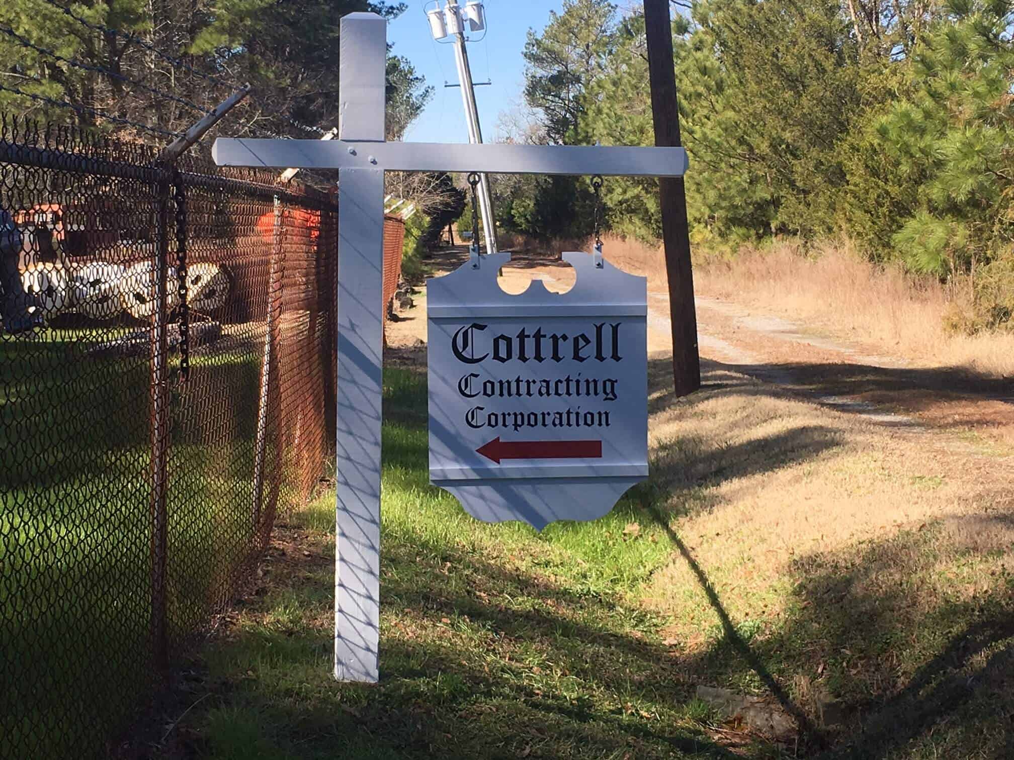 Directory style wood signs - Hanging sign for Cottrell Contracting Corp.