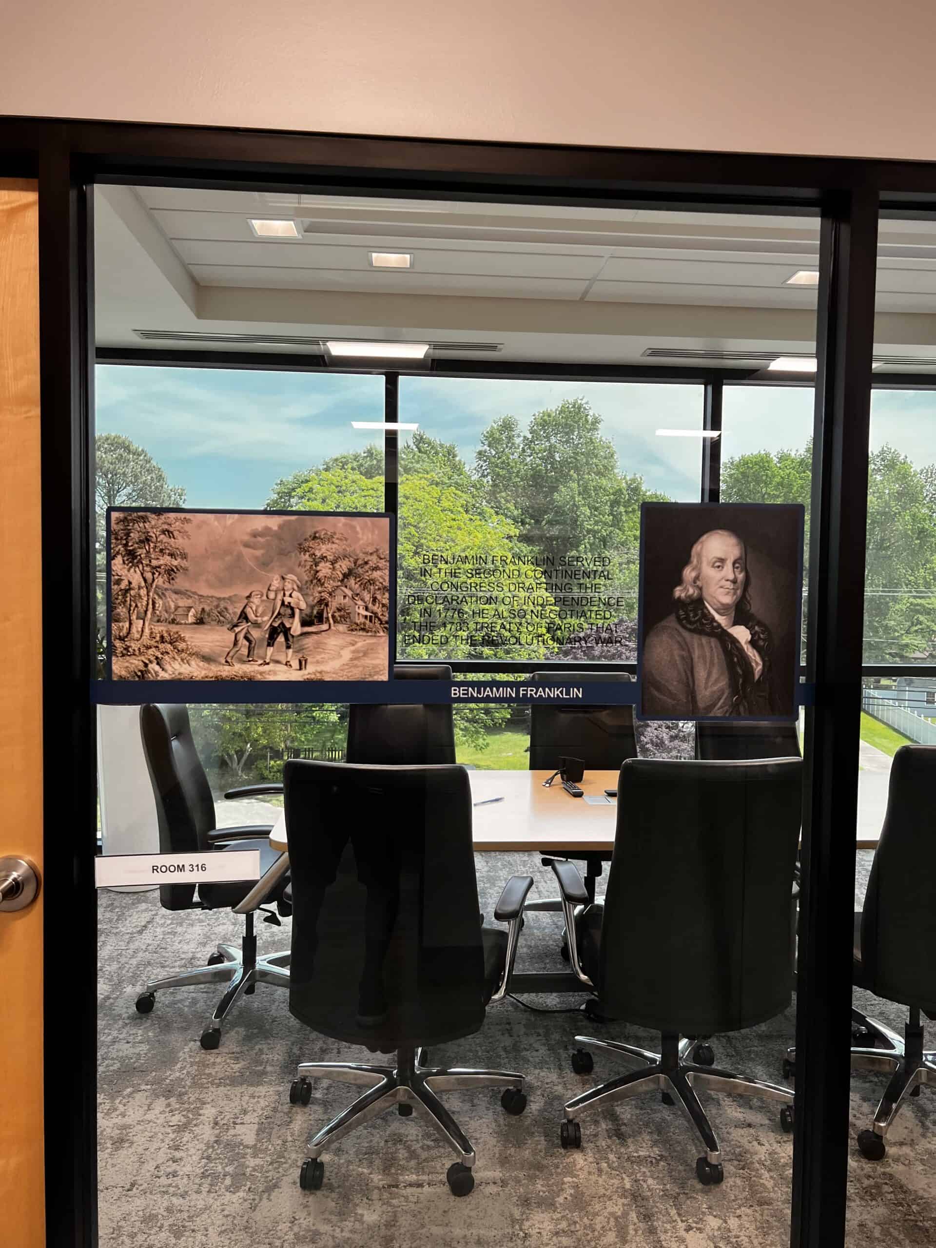 Ben Franklin graphics for conference room glass by DeSigns, Inc.