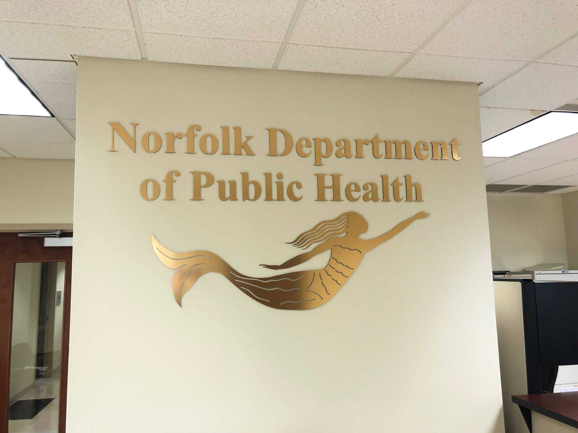 Brushed gold lettering lobby signs  by DeSigns, Inc.