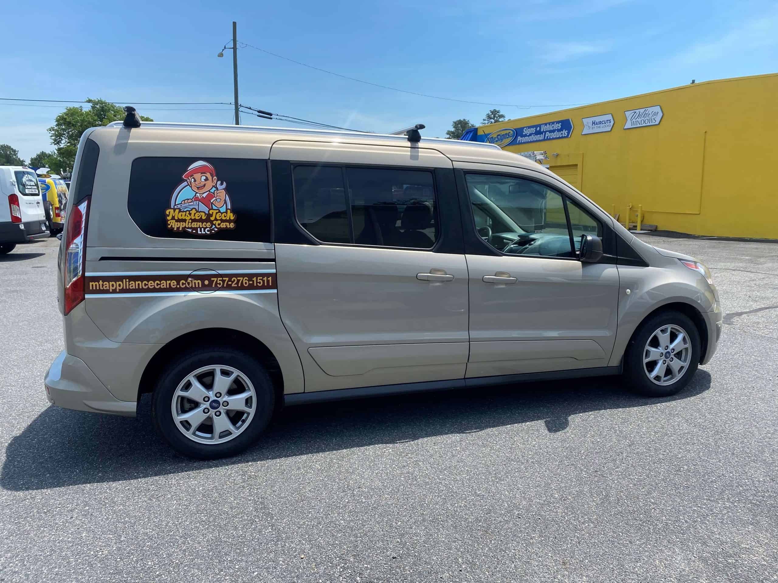 Van window graphics advertising on mini van for Master Tech Appliance Care